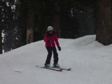 2013-02-03 Annette in the trees half way down with it snowing