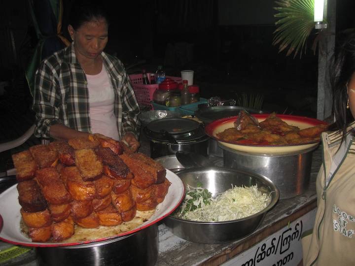 Eating and trying the local food was a big part of our trip, here a street stall in Meiktila cooking samosas.