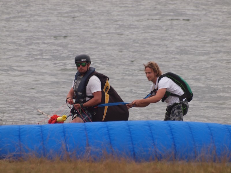 Roger and Michael Bass about to take off with Michael to &ldquo;BASE&rdquo; jump from tandem.<br />Note wing is Trents which is the same colour as mine.